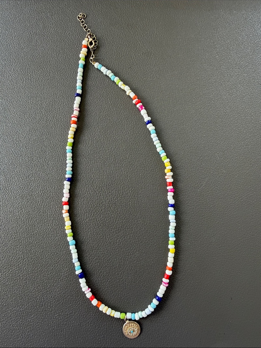 Multicolor Seed Bead Necklace with Gold evil eye charm